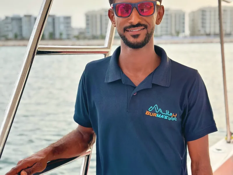 A member of the Burmae crew on deck