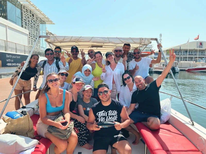 A happy group on the boat at the marina